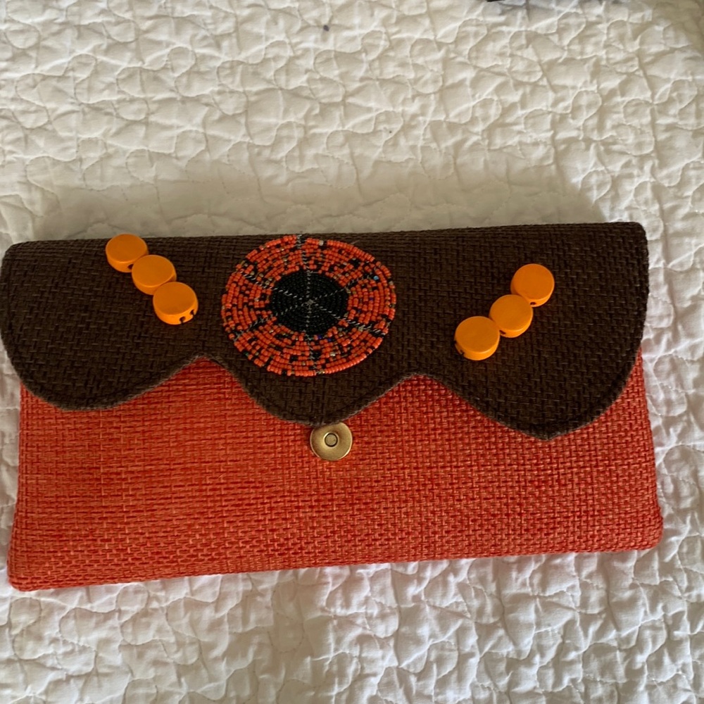 Perfect clutch for fall orange woven base with beaded top